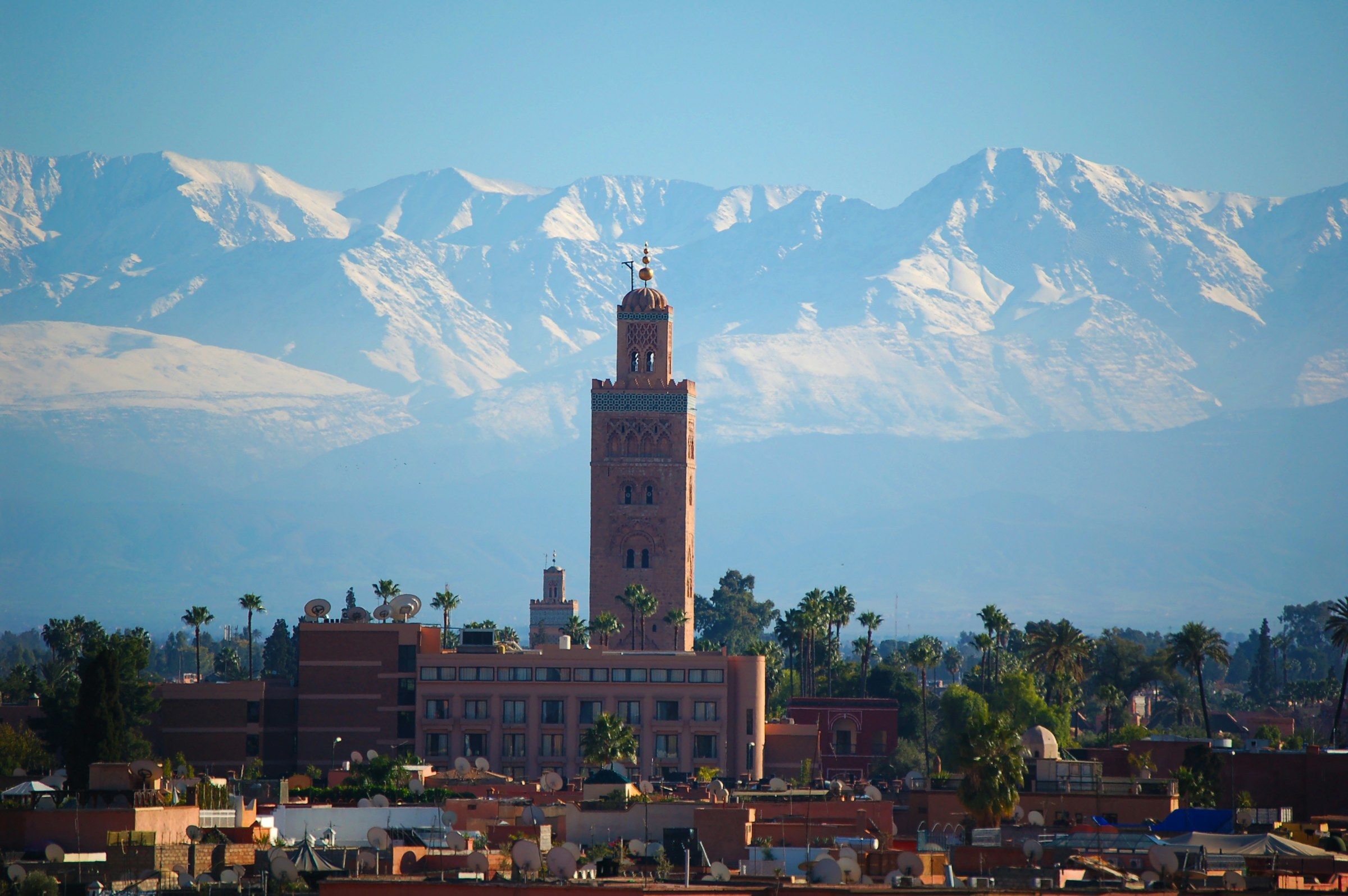 Marrakech, the Koutoubia minaret and the snow-capped High Atlas